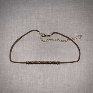 Gold and leather choker necklace